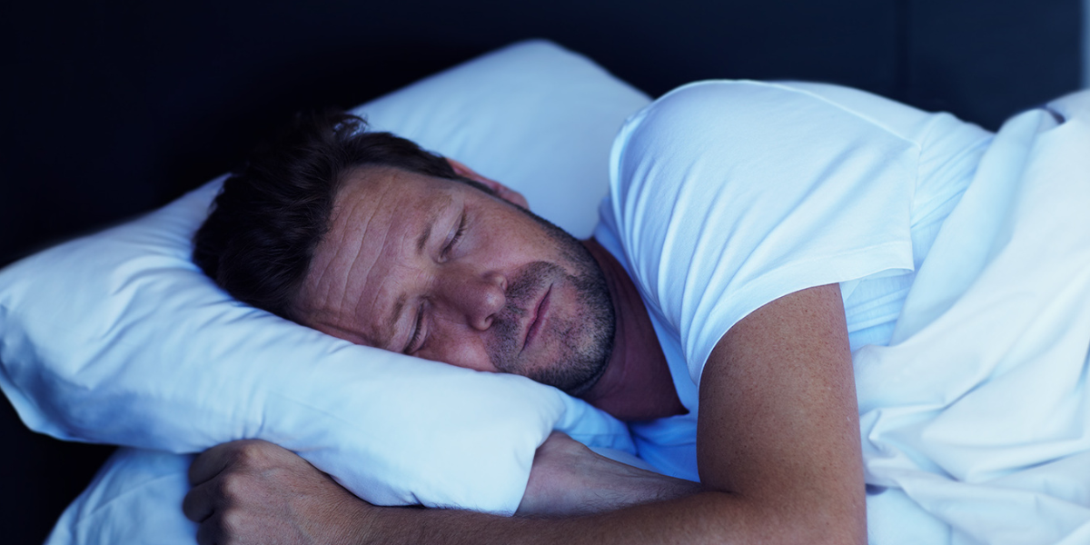 a man sleeping tight