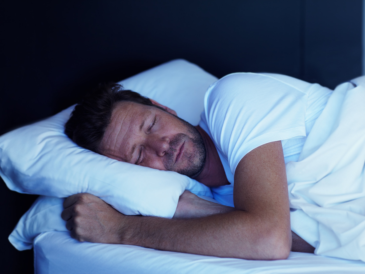 a man sleeping tight