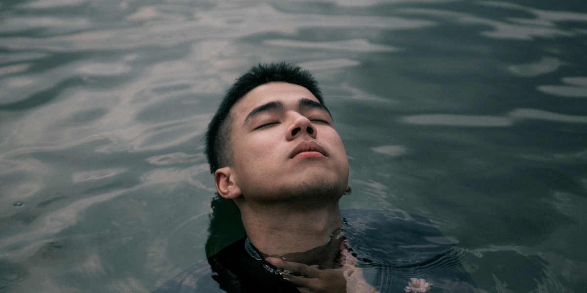 A man swimming in water