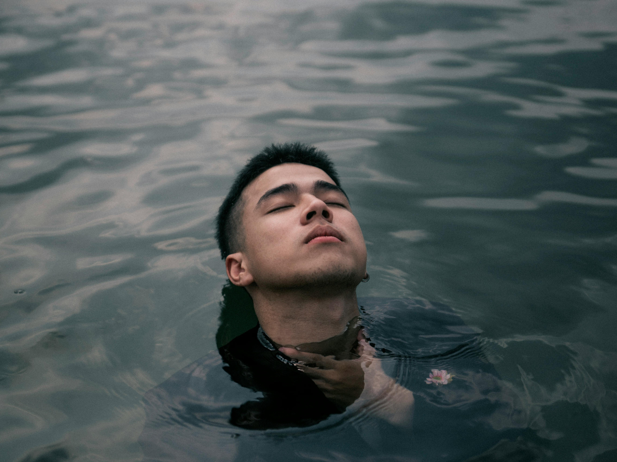 A man swimming in water